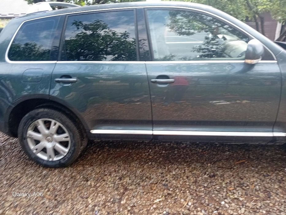 Motor/cutie de viteze/compresor ac/pompa servo/injectoare/electromotor/carlig remorcare electric/perne/usa/hayon/oglinda/far xenon touareg 7L  5.0 tdi