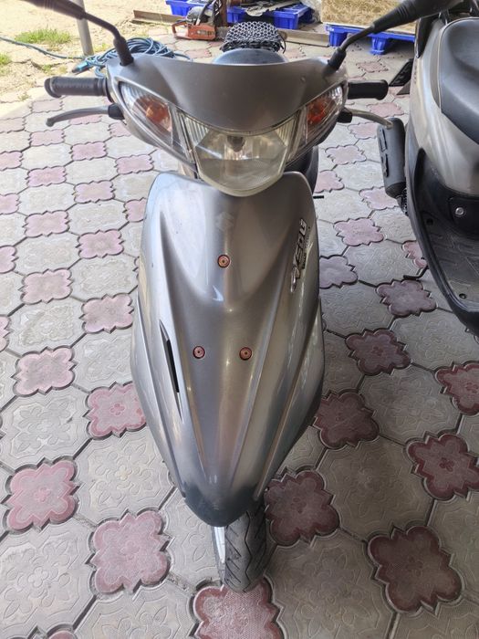Мопед Suzuki, Honda
