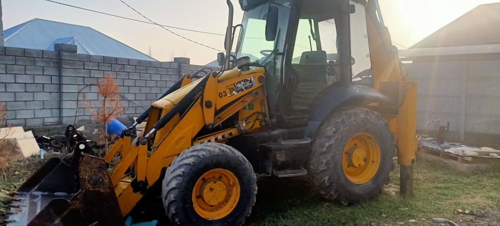 Экскаватор погрузчик 3в1