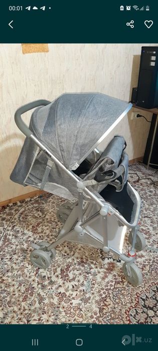 Продам коляску лёгкую и дождевик