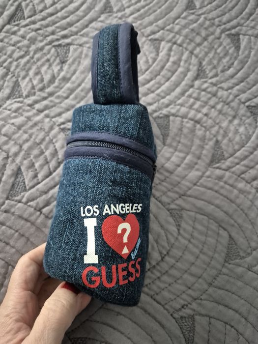 Huse pentru biberoane Guess