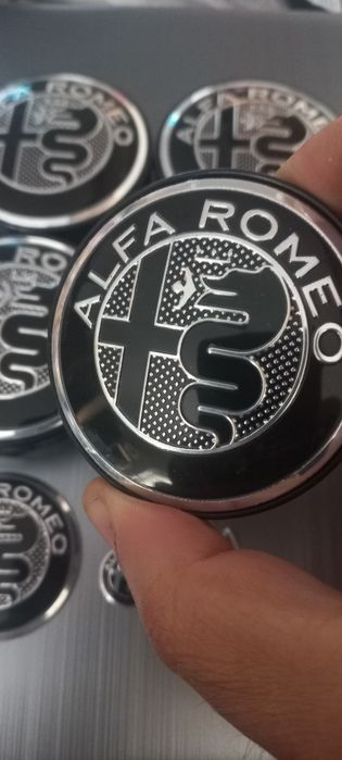 Alfa Romeo - Set embleme si capace - 4 capace pentru jante aliaj
