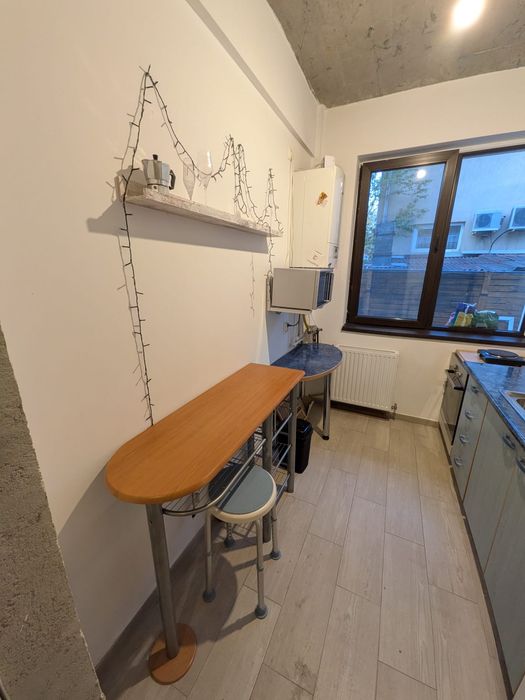 Închiriez studio (garsoniera)