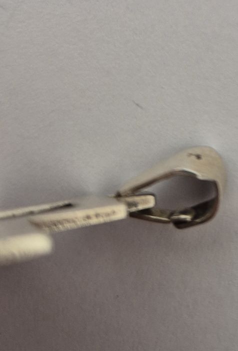 Сребърен кръст неразличим от нов