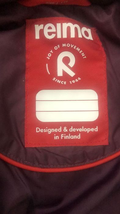 Продам зимний пуховик,Reima