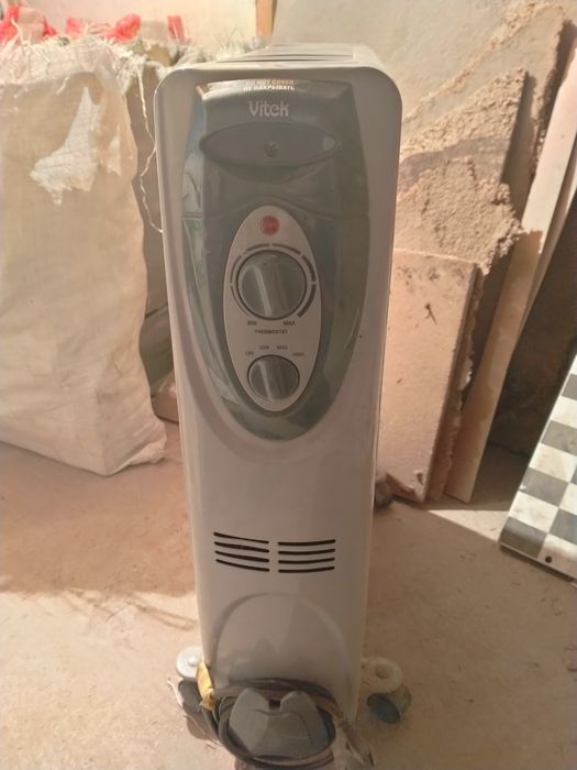 Обогреватель масляный.