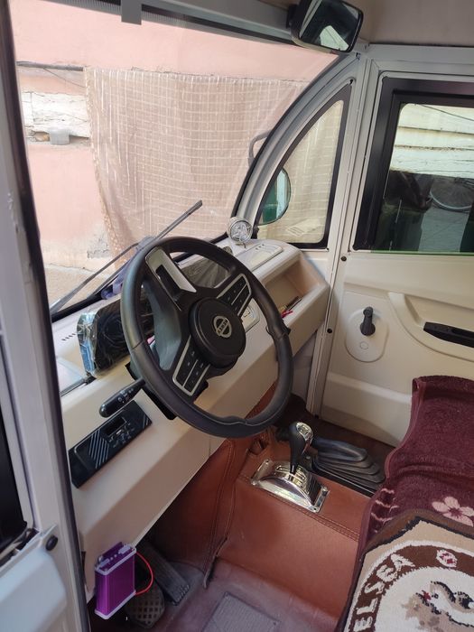 Электронный мотоцикл янги