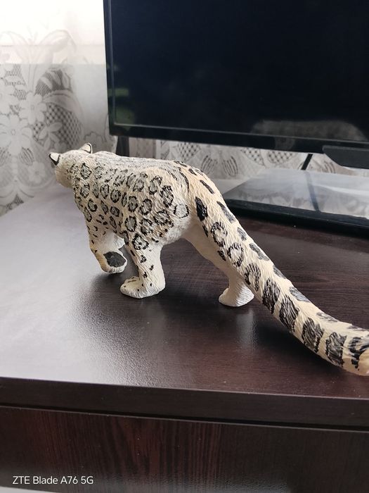 Фигура на снежен леопард