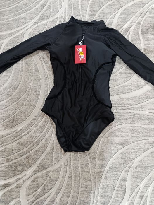 Новый купальник L размер