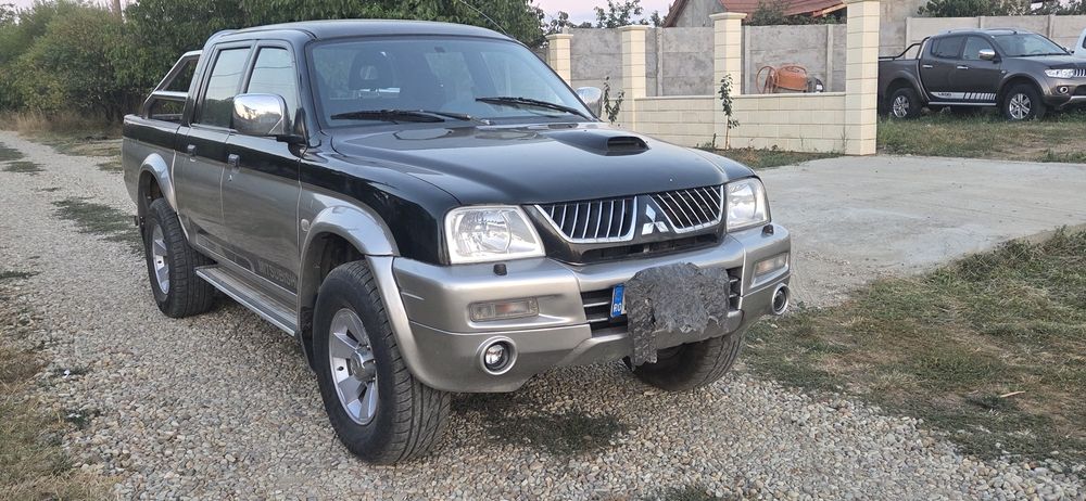 Mitsubishi L 200 climatronic 4x4 cuplaj la mare la mic Diferitial blocabil la buton