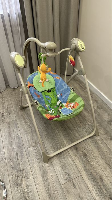 Детские качели автоматические