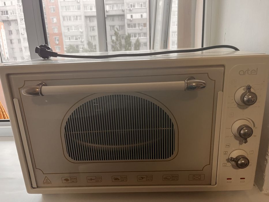 продам электропечь artel