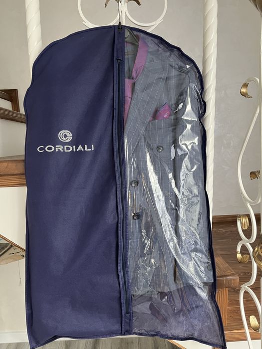 Костюмы 48 размер