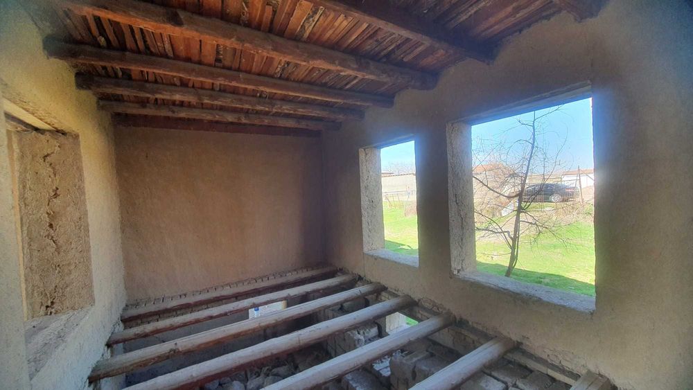 Добротный дом с деревянным каркасом с теплицей в 10 км от Ташкента.