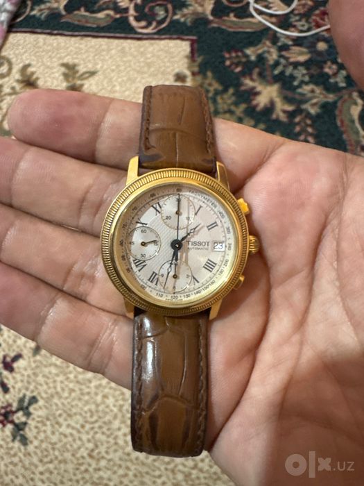 Золотые часы 750 пробы марки Tissot Bridgeport T71, общий вес 89 грамм