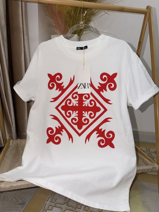 Женские футболки