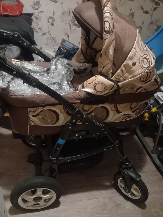 Продам коляску,санки.