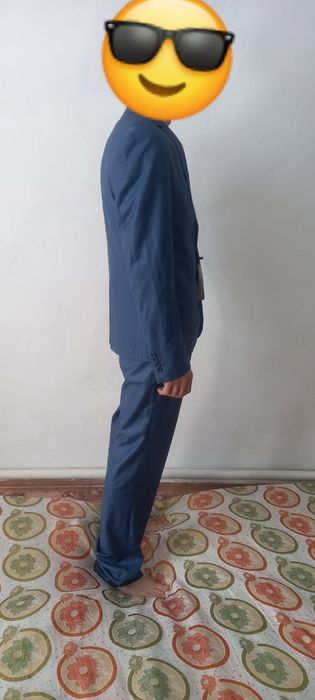 Продам новый костюм