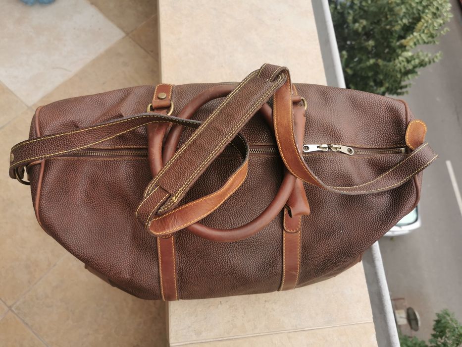 Geanta de voiaj (weekender/duffel) din piele texturată de la brandul Timberland