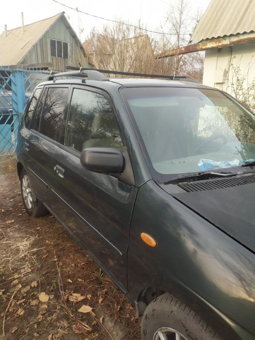 Продам машину Mazda Demio