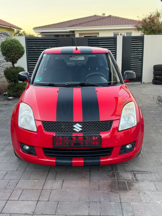 Suzuki Swift 1.3 Benzină • 2009 • Automată • 90 CP