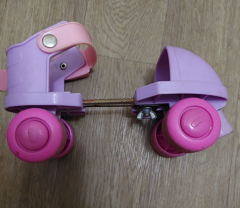 Роликовые коньки