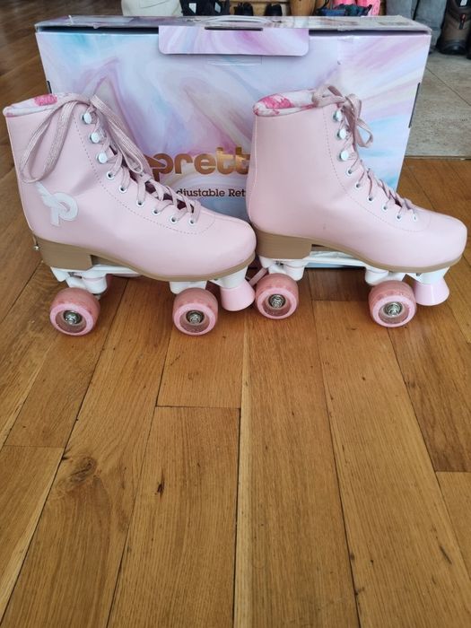 Patine cu rotile culoare roz,marime reglabila 35-38