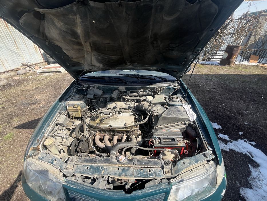 Машина Мицубиси Харизма