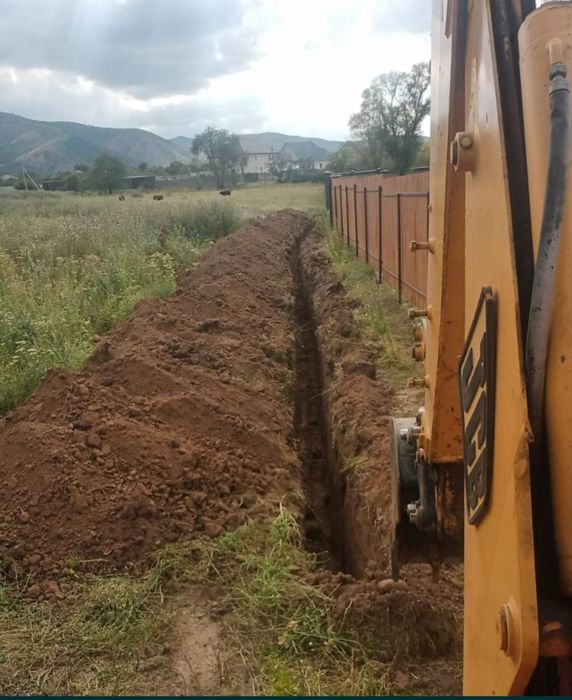 Экскаватор погрузчик трактор Талгар