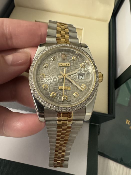 Часы с брилиантами Rolex унисекс