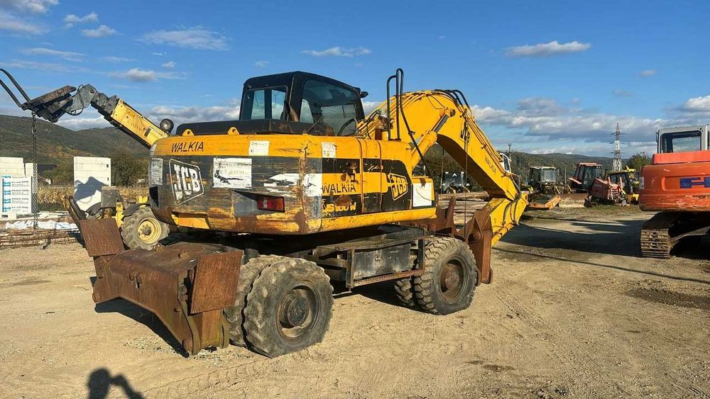 Dezmembrez excavator pe roti JCB JS 160 W