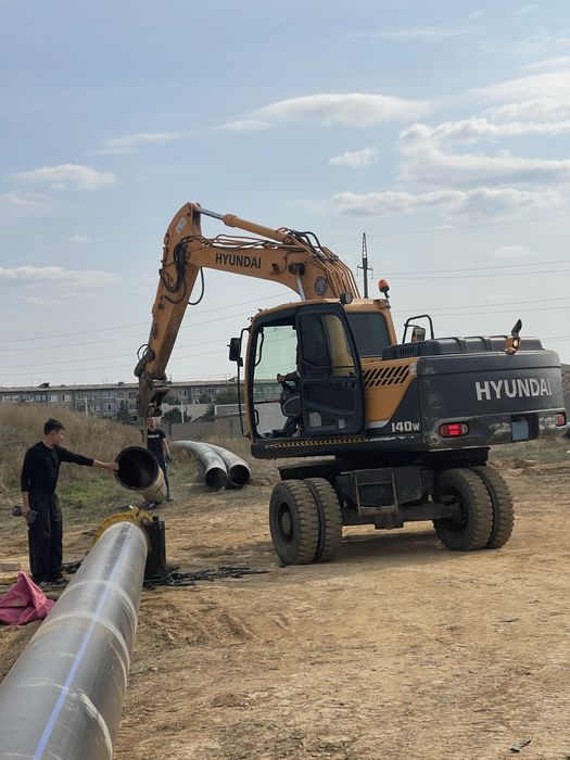 Колесный экскаватор аренда