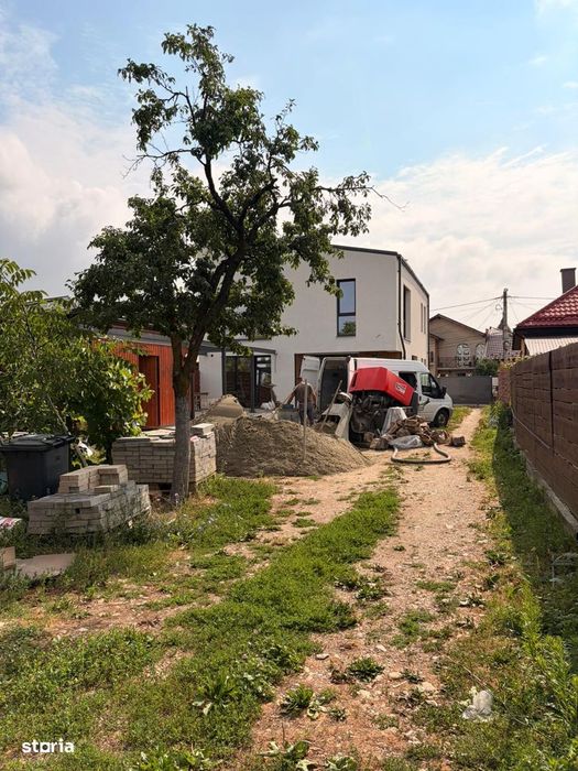 Casă individuală cu arhitectură contemporană 166 mp utili teren 450 mp