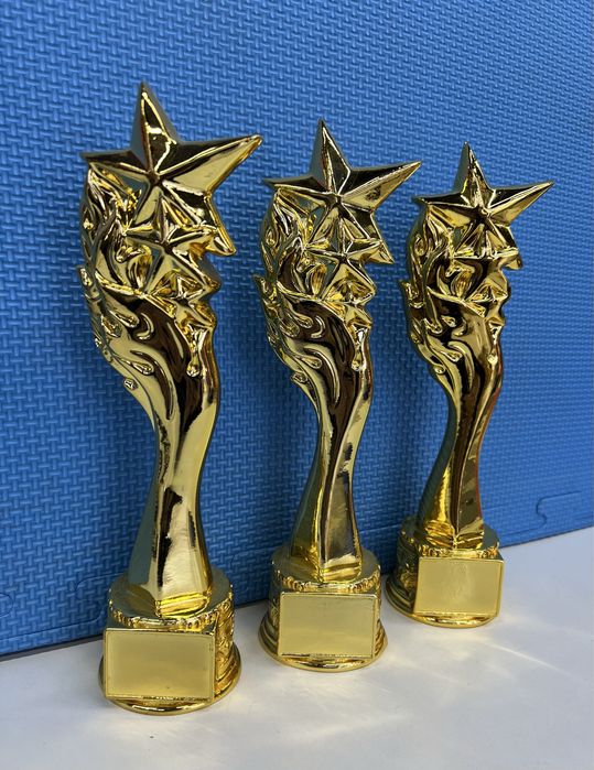 Статуэтки кубки медали награды