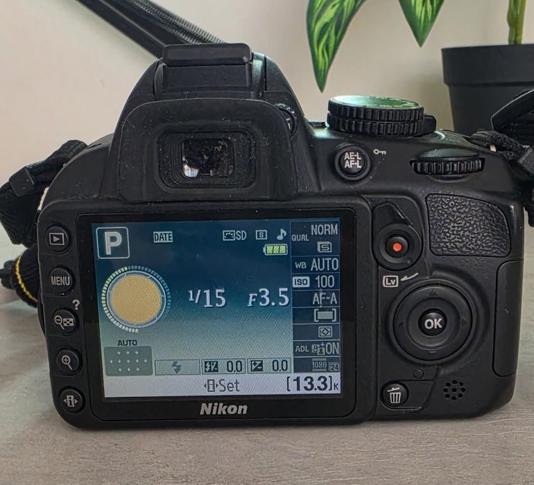 Фотоапарат  D3100