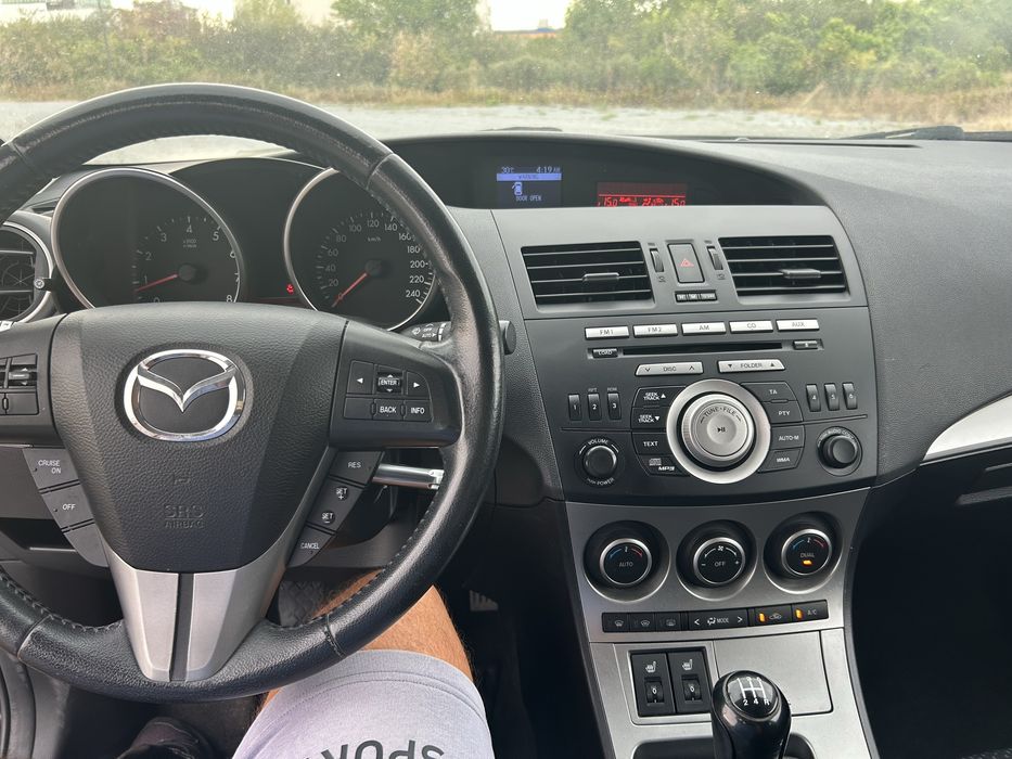 Mazda 3 1,6 benzina 105 cp 2010