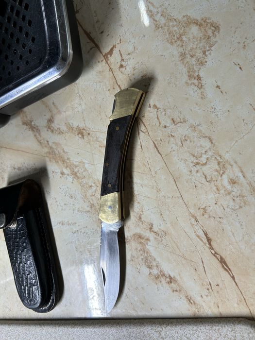 Briceag cu teaca folosit foarte putin!