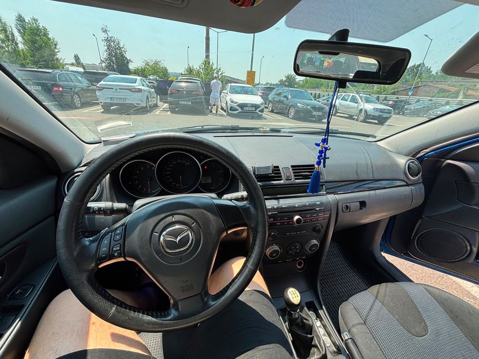 Vand mazda 3 1.4 benzina an 2006 masina merge fine traga bine nu are nimic propleme