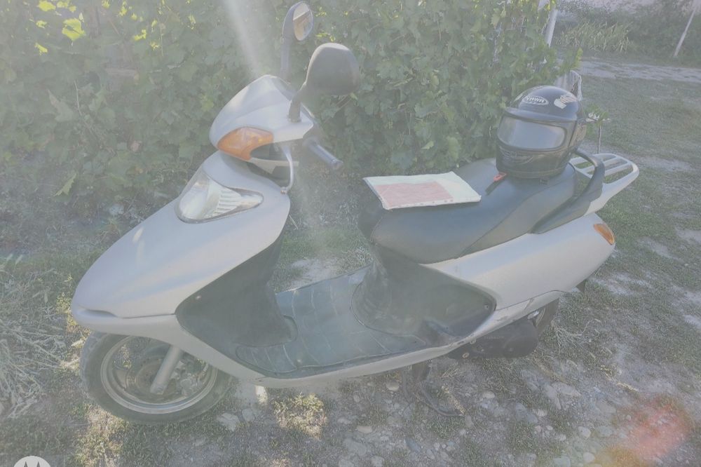 Honda Spacy 100 Скутер