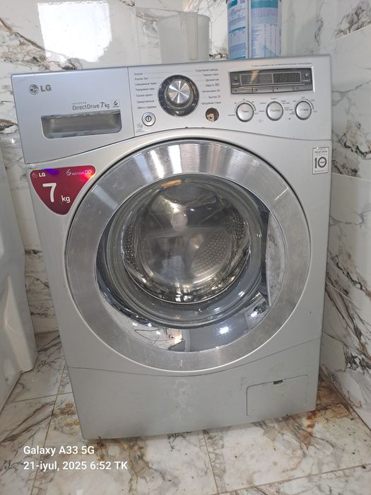 LG kir moshina Xolati yahshi aybi knopkasi qattiq bosilib ichiga kirga