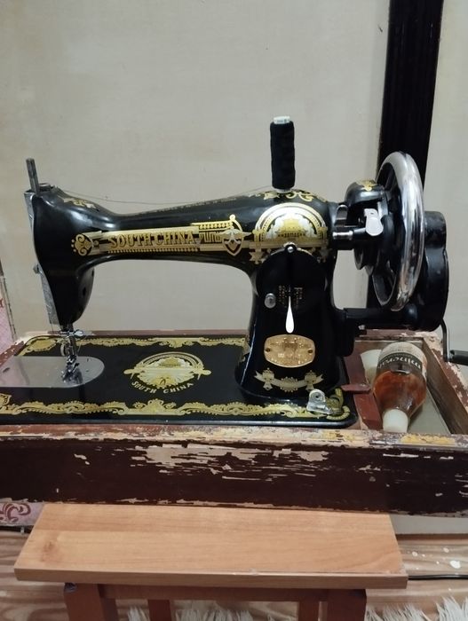 Ручная швейная  машинка.