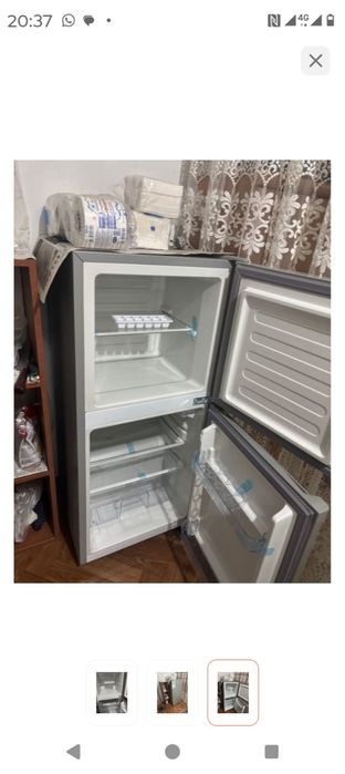 Продам холодильник почтии новый