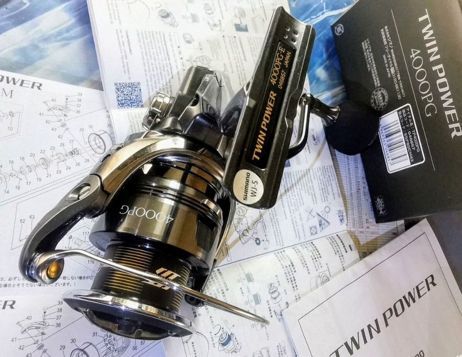 Подарок . Катушка рыболовная.