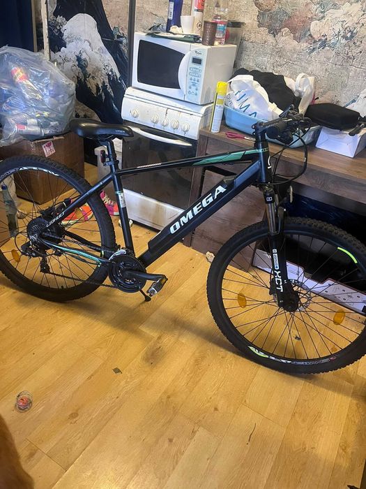 Bicicletă electrică Omega Liohult 29", sub 100 km, garanție până în august 2027