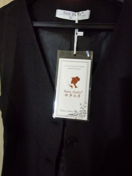 Продам женский жилет