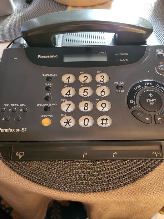 Телефон и факс Панасоник