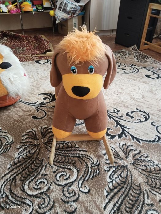 Игрушка - качеля