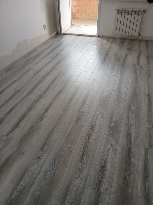 Укладка ламината и кварцвинила