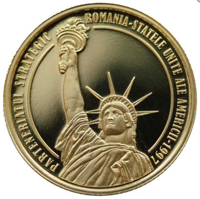 Moneda aur BNR 100 Lei, parteneriat Romania-SUA, gradata NGC PF 67 UC