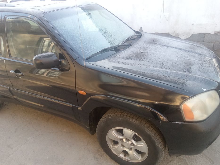 Продам срочно Mazda Tribute